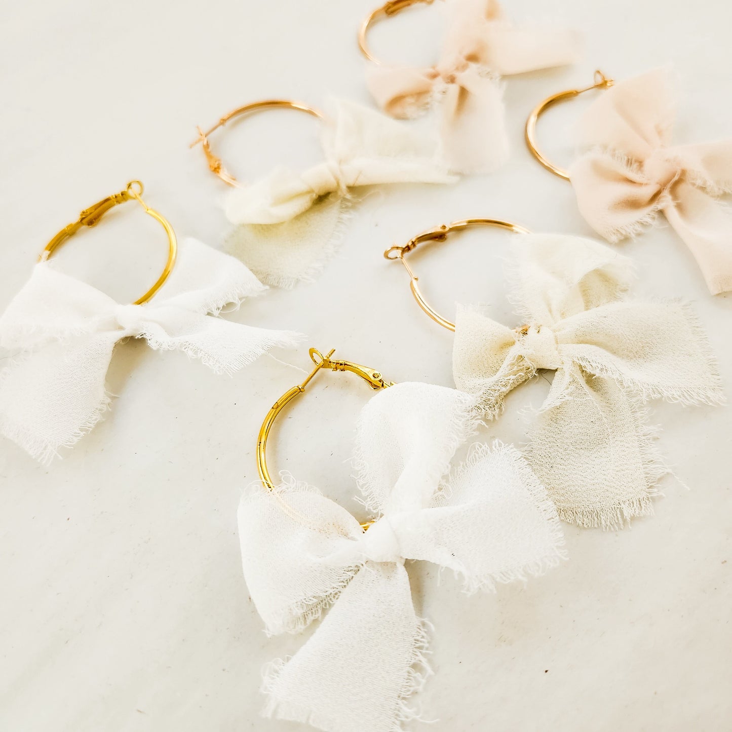 Chiffon Bow Mini Hoop Earrings available with gold or silver details