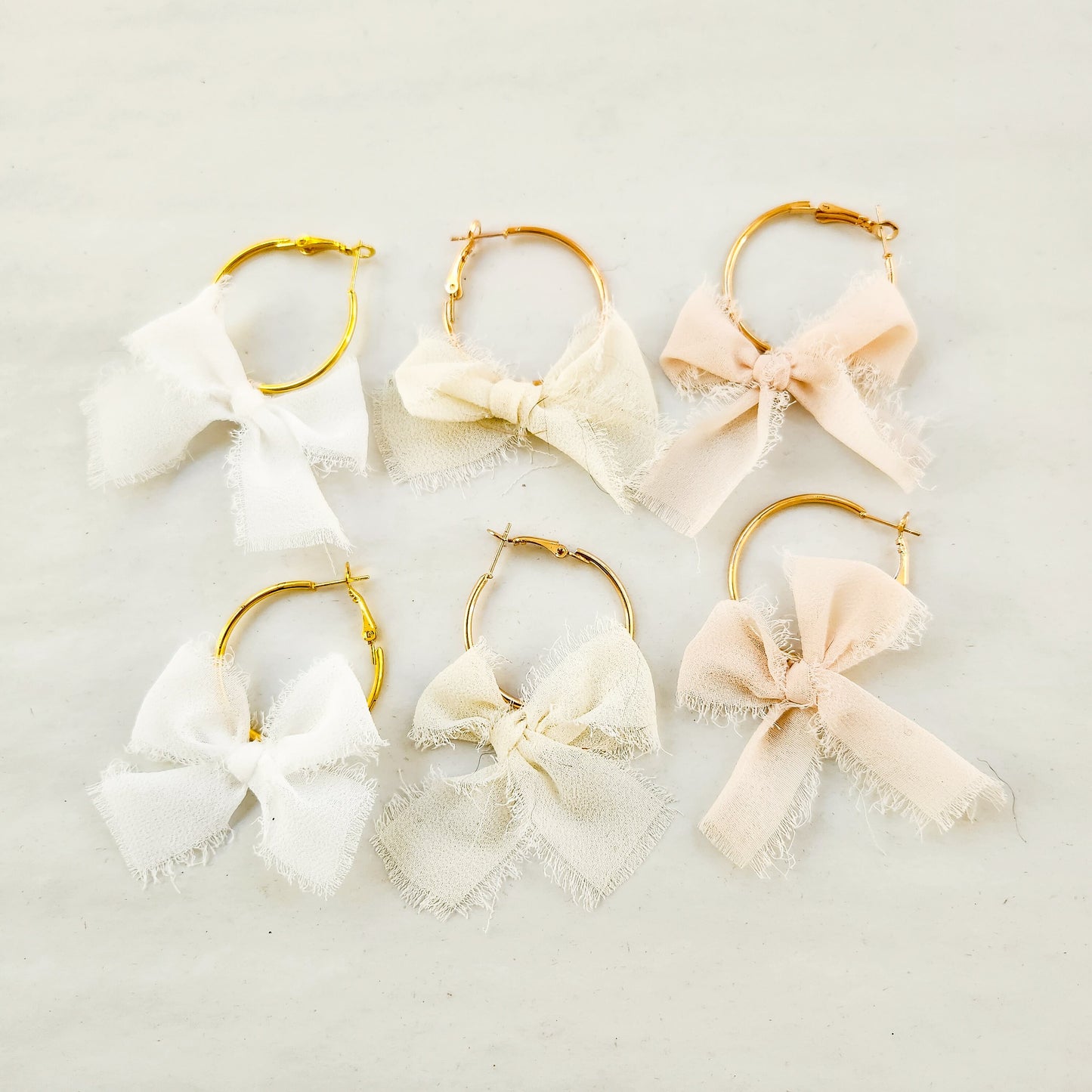 Chiffon Bow Mini Hoop Earrings available with gold or silver details
