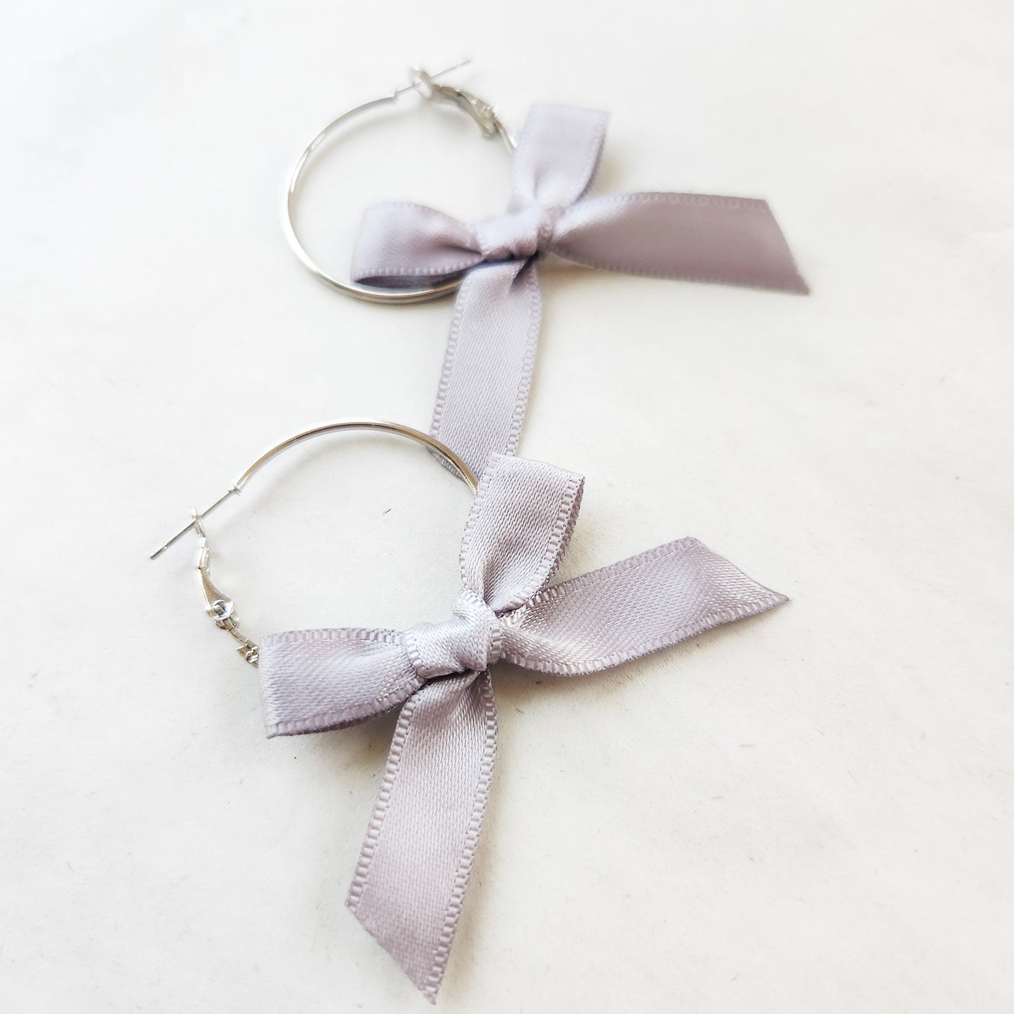 Mini Bow Hoop Earrings Pastel Collection available with gold or silver details