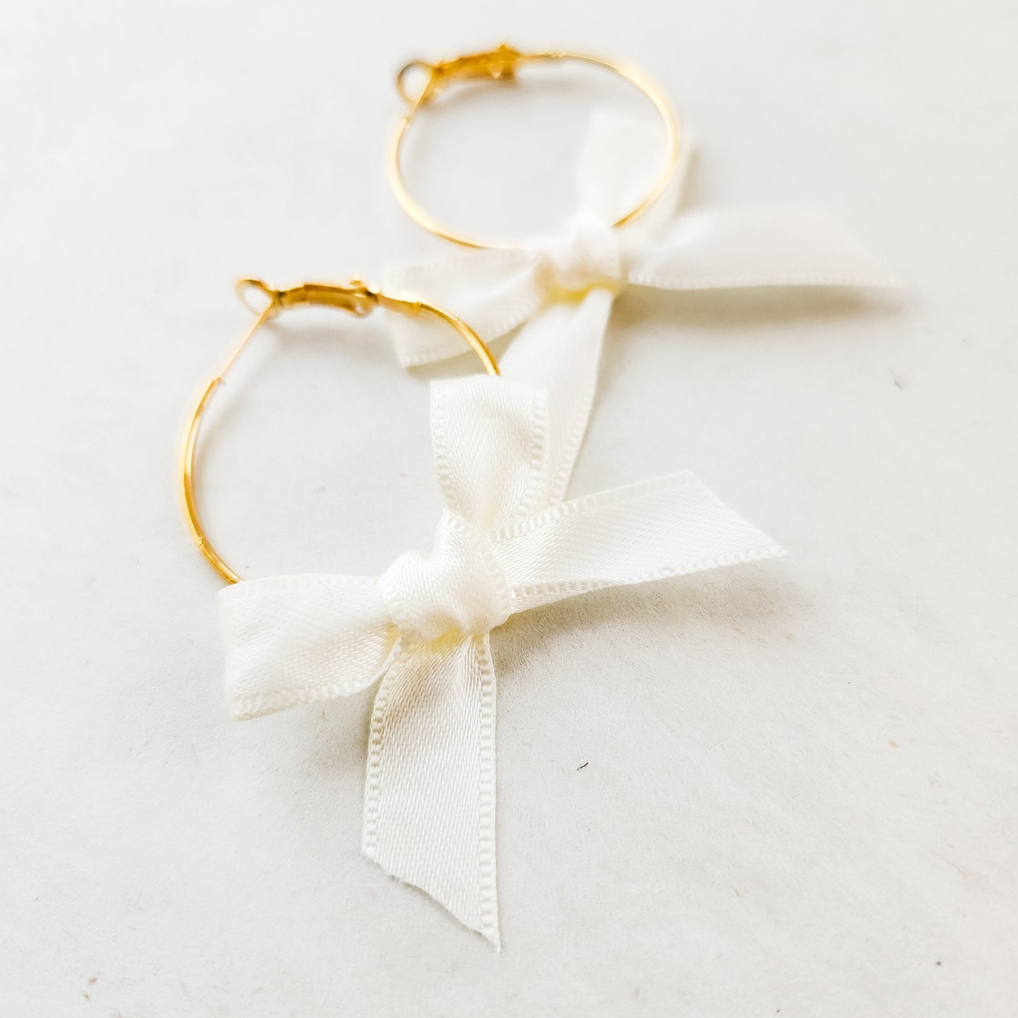 Mini Bow Hoop Earrings Pastel Collection available with gold or silver details