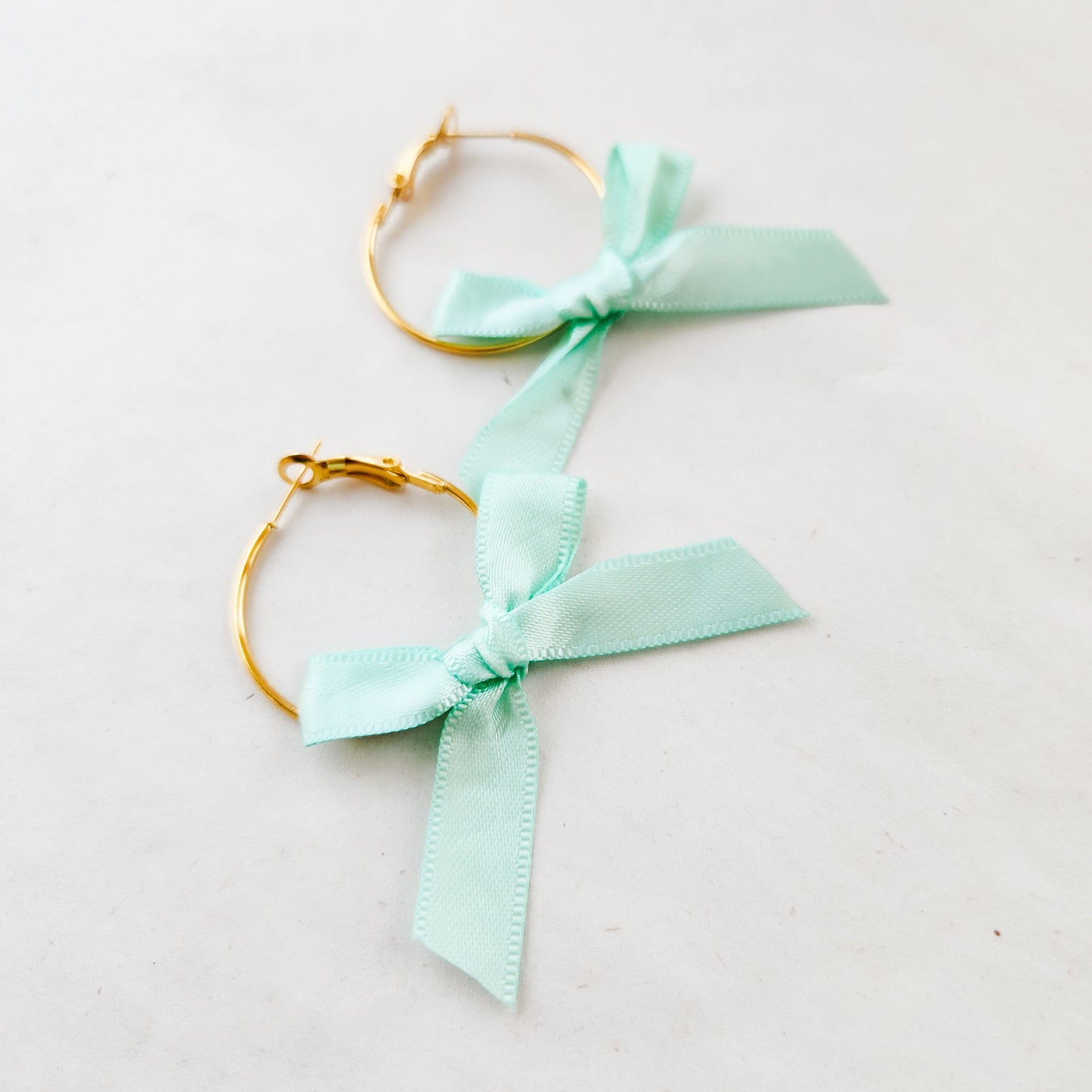 Mini Bow Hoop Earrings Pastel Collection available with gold or silver details