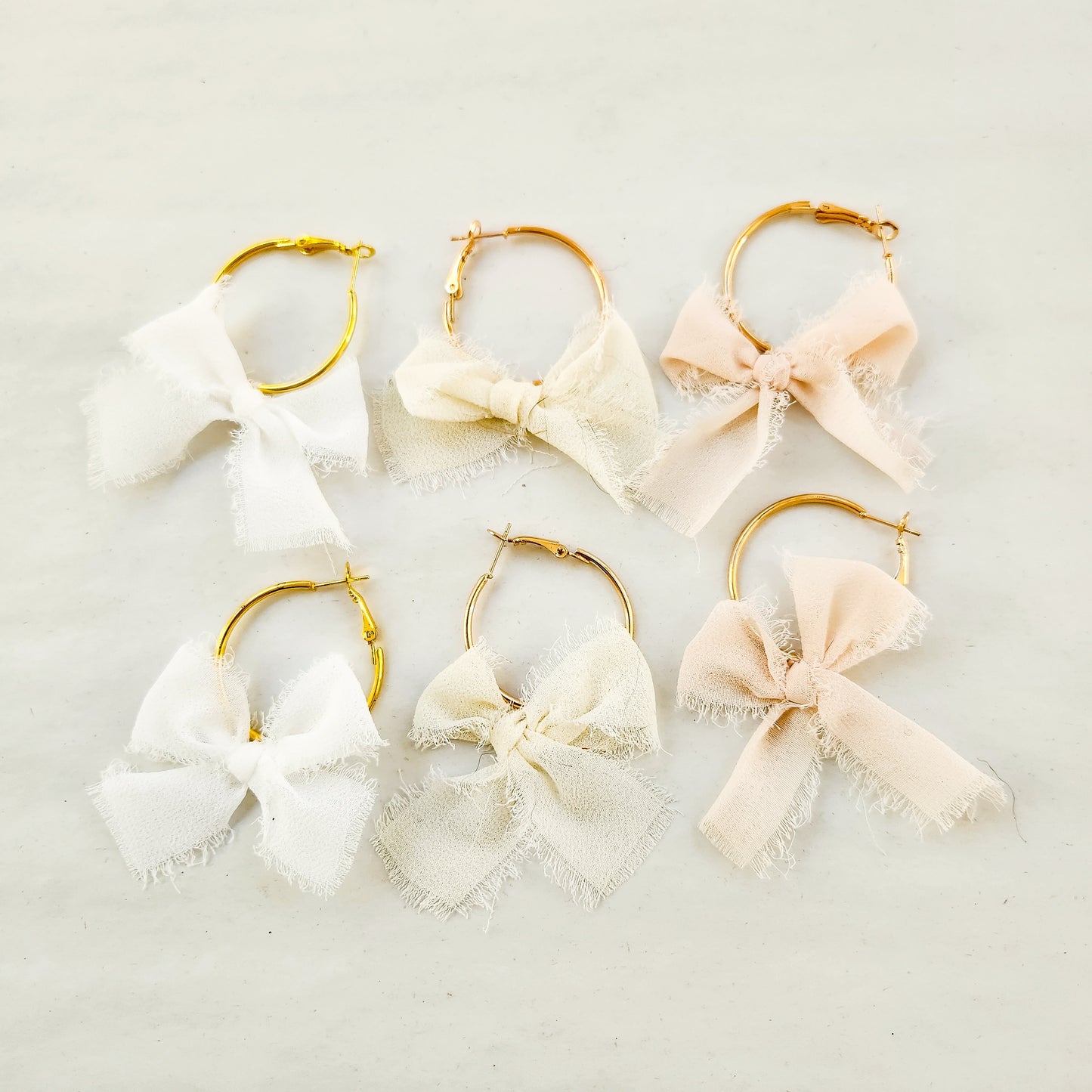 Chiffon Bow Mini Hoop Earrings available with gold or silver details
